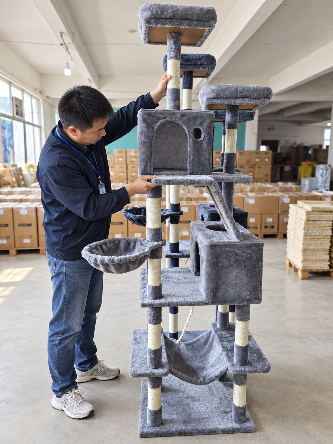 Assembled cat tree structure and connection points being reviewed