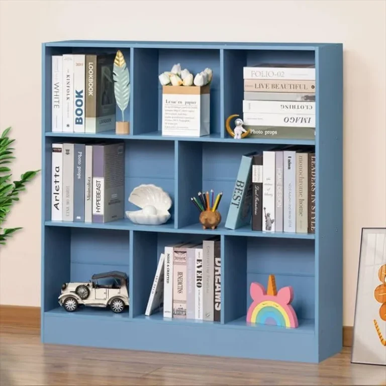 Blue bookcase with mixed-width compartments holding books and toys
