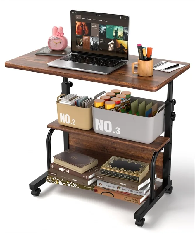 Rolling adjustable desk with a laptop above two lower storage shelves