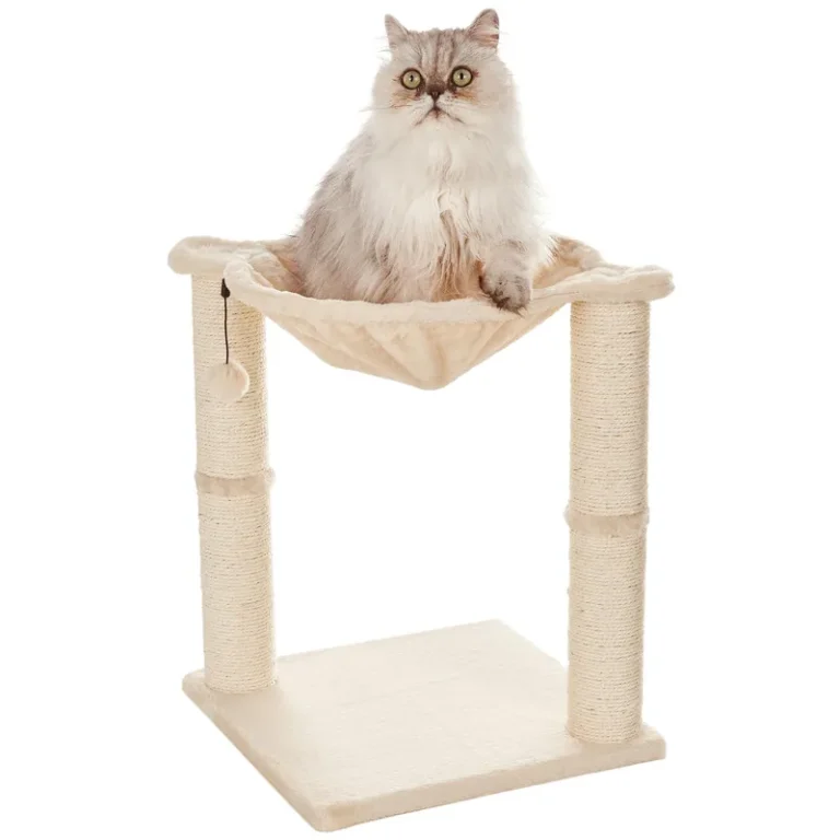 Beige raised cat hammock with two scratching posts and a hanging ball