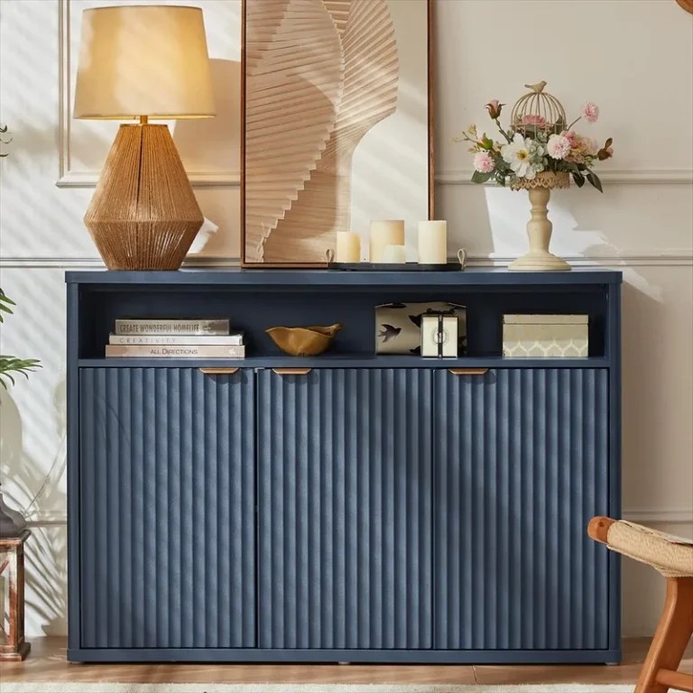 Dark navy sideboard with three fluted doors and an open upper shelf