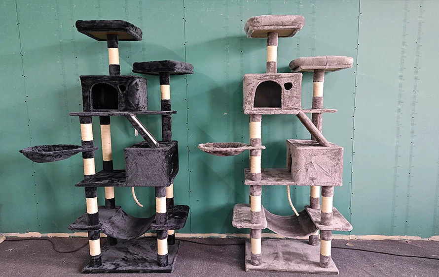 Two cat tree configurations displayed side by side for sample review