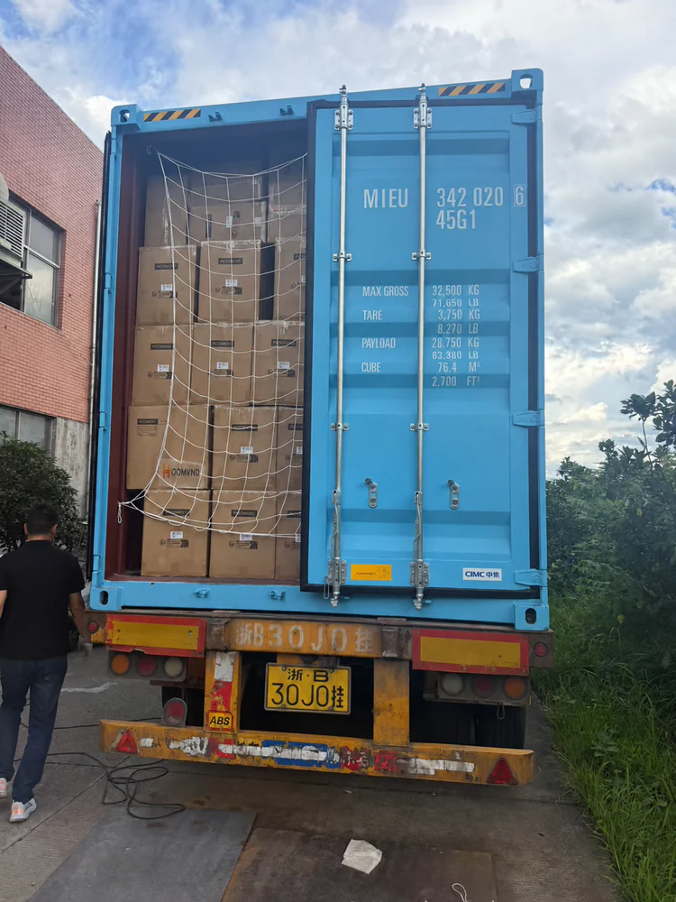 HOMVND cat tree cartons loaded in an export container on a truck