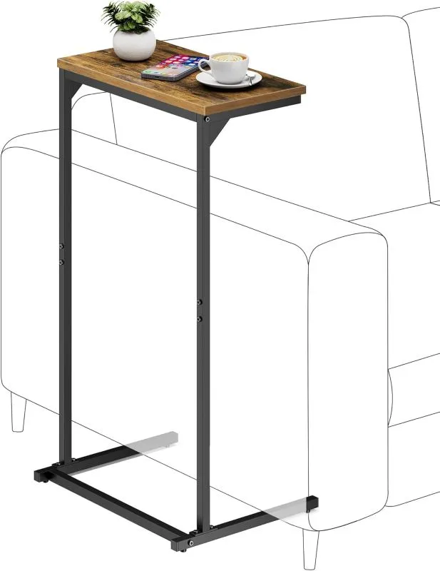 Brown wood-effect C-shaped side table with a black frame positioned over a sofa arm