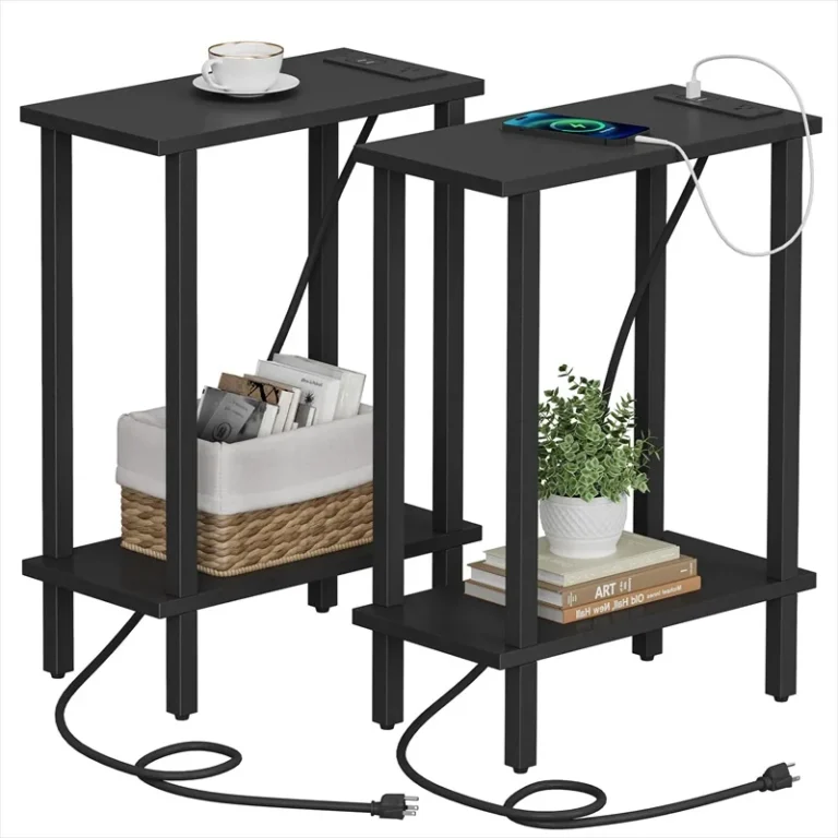 Pair of black two-tier side tables with charging modules and power cords